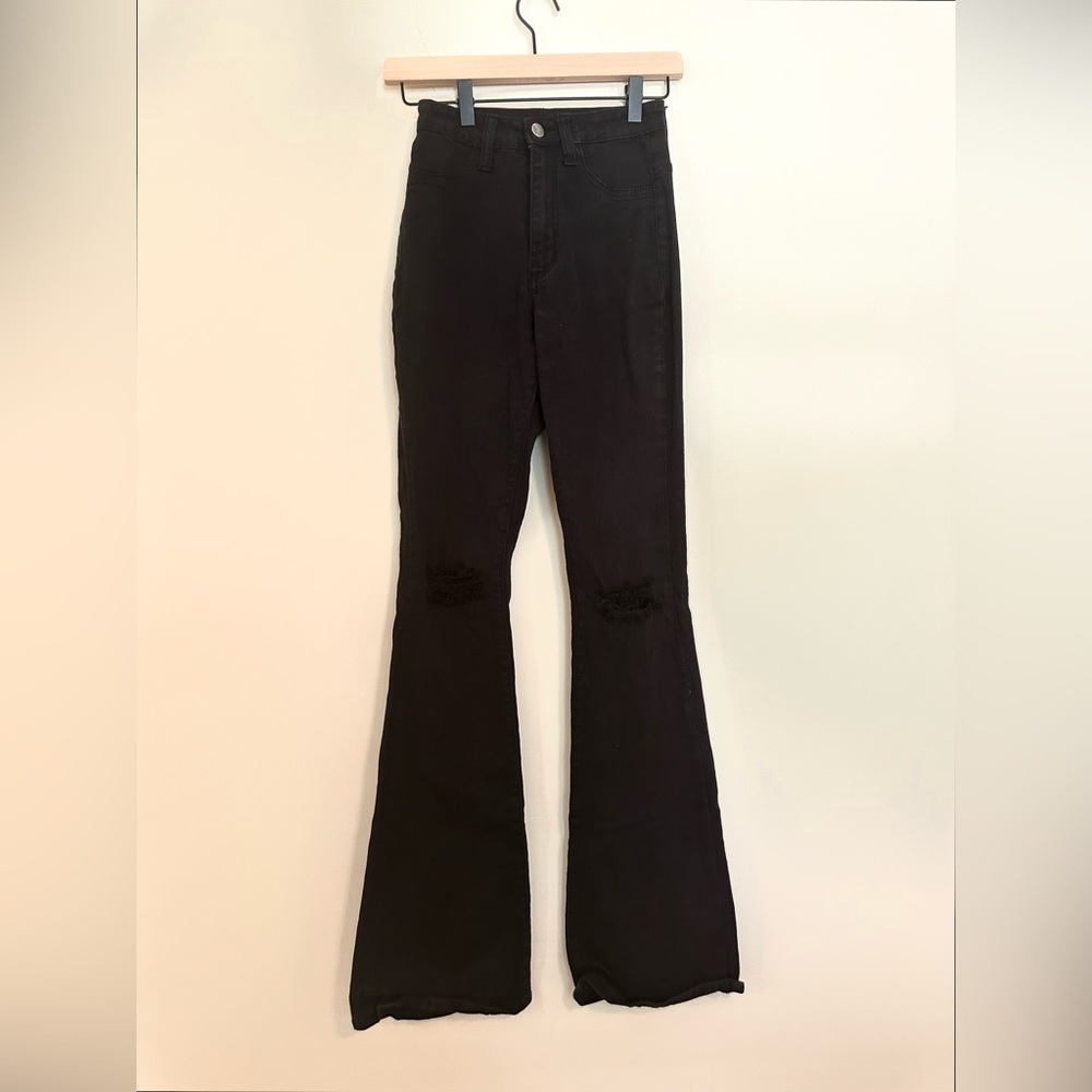 high waisted black ripped flare jeans